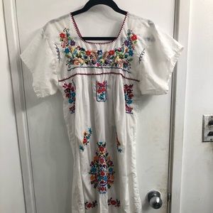 Hand embroidered over up dress